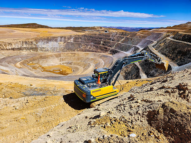 Construction machinery working in open pit mine Construction machinery working in open pit mine