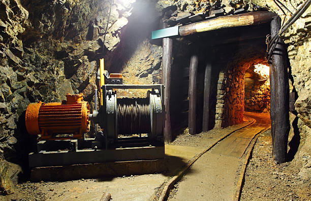 Tunnel with carts in gold silver and copper mine Tunnel with carts in gold silver and copper mine